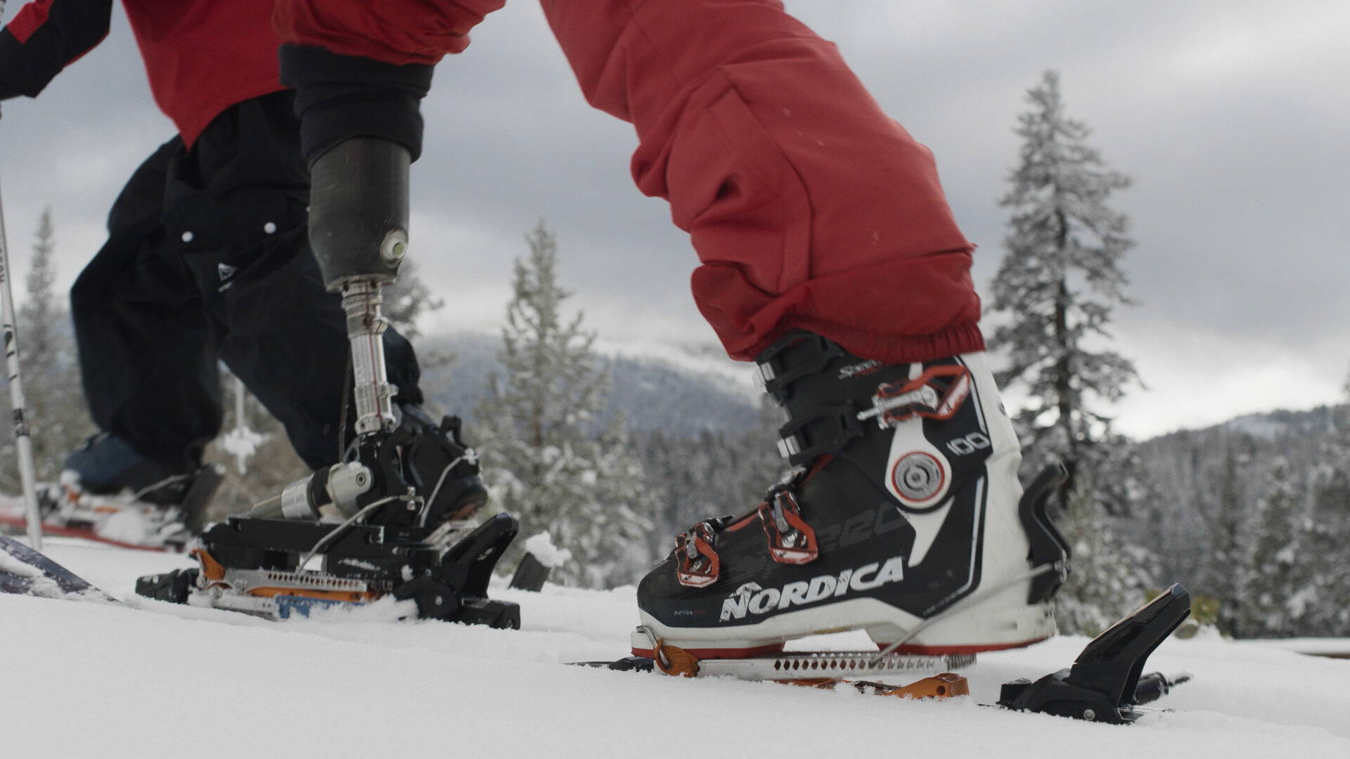 Albert's prosthetic leg clicking into a ski boot